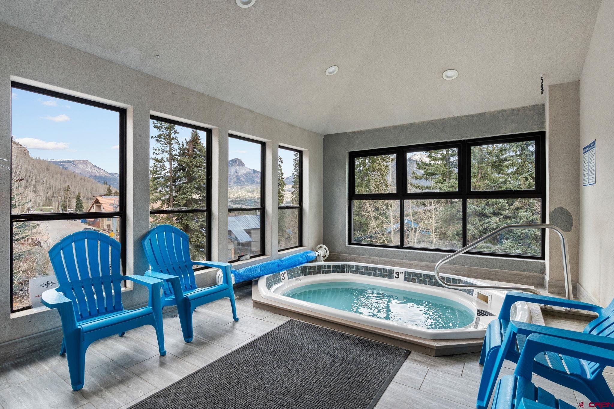455 Sheol Street, Unit 109 Durango, CO 81301 - Photo 19 of 31 a living room with furniture and a large window