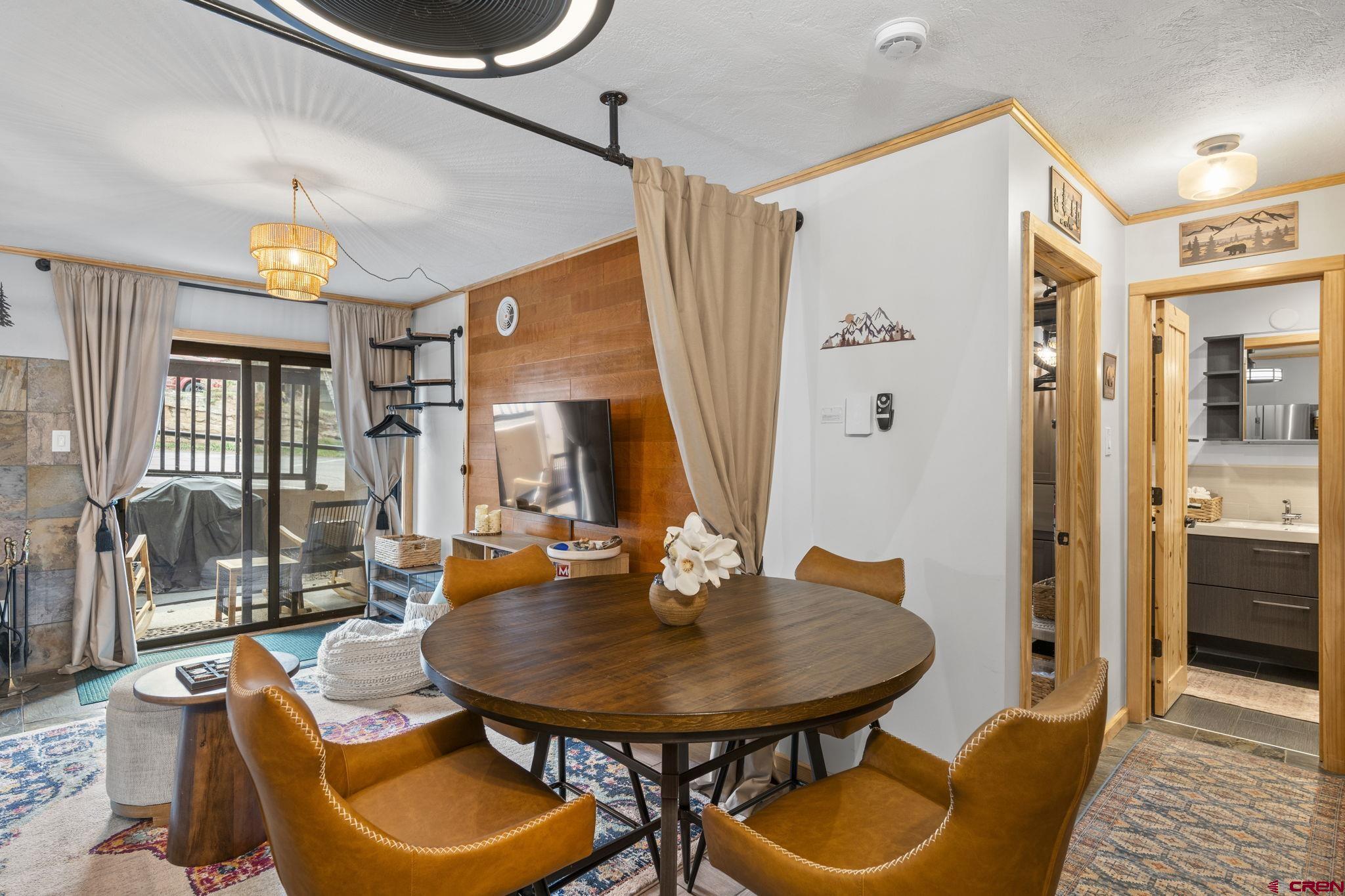 455 Sheol Street, Unit 109 Durango, CO 81301 - Photo 4 of 31 a balcony with table and chairs