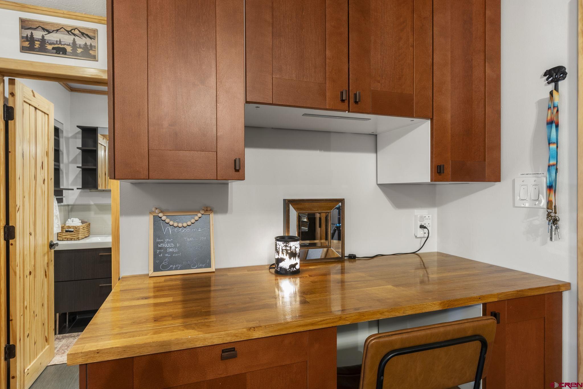 455 Sheol Street, Unit 109 Durango, CO 81301 - Photo 8 of 31 a kitchen with a sink cabinets and appliances