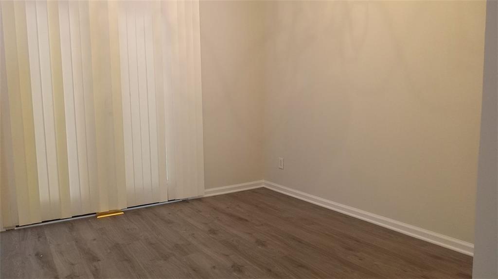 755 Crestwell Circle Atlanta, GA 30331 - Photo 12 of 29 a view of a small space with wooden floor