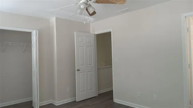 a view of a hallway with closet