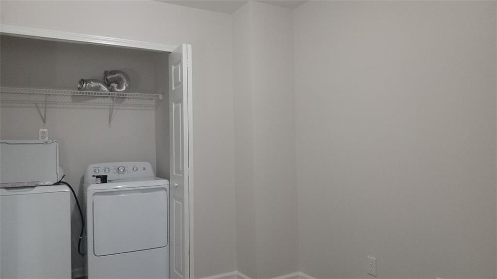 755 Crestwell Circle Atlanta, GA 30331 - Photo 20 of 29 a utility room with dryer and washer