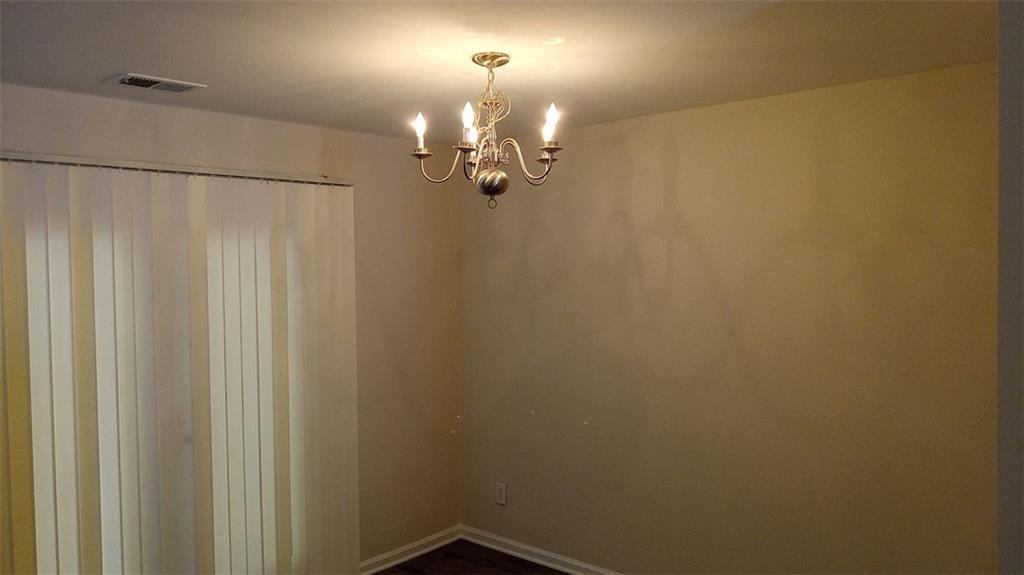 755 Crestwell Circle Atlanta, GA 30331 - Photo 7 of 29 a view of a chandelier