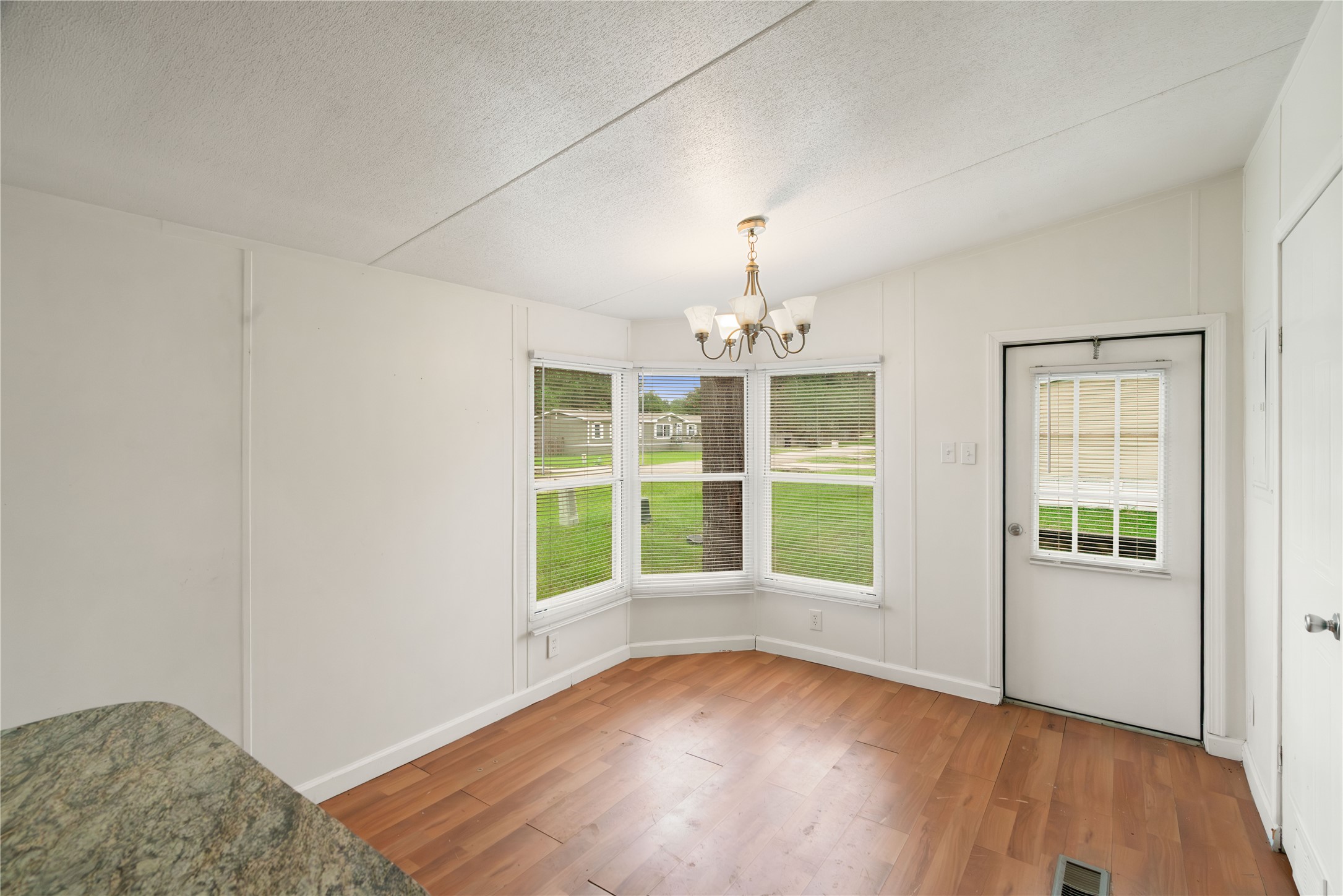 191 Aquarius Road Conroe, TX 77306 - Photo 17 of 32 Dining room without virtual staging.