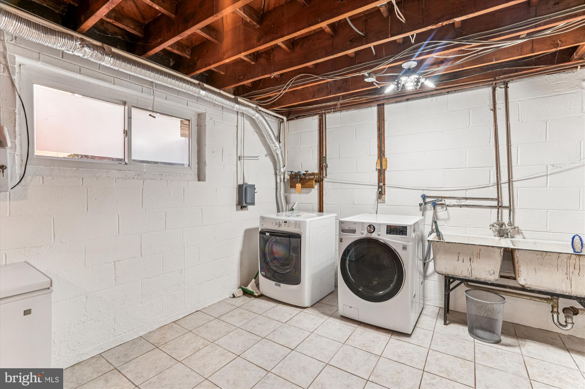 5813 Midhill Street Bethesda, MD 20817 - Photo 40 of 55 a utility room with dryer and washer