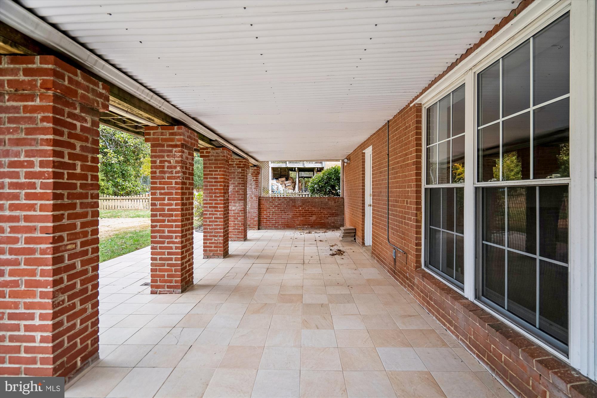 5813 Midhill Street Bethesda, MD 20817 - Photo 46 of 55 a view of empty room with a large window