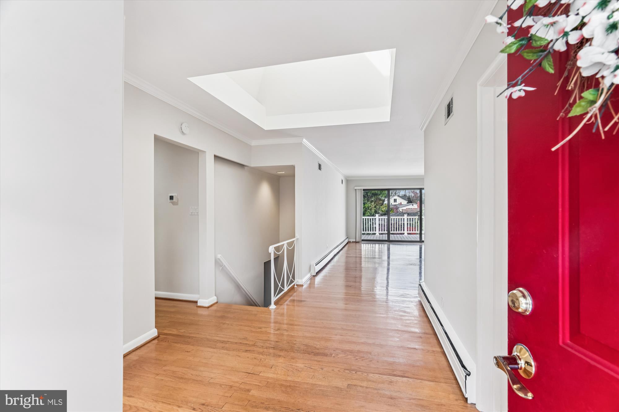 5813 Midhill Street Bethesda, MD 20817 - Photo 6 of 55 a view of entryway with wooden floor