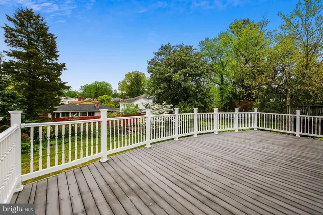 a view of a balcony with wooden floor