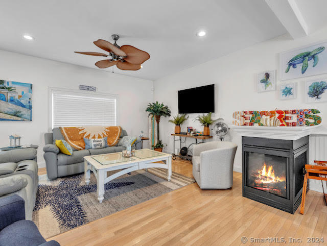 17 Spring Glen Road, Unit A East Lyme, CT 06357 - Photo 12 of 32 a living room with furniture and a fireplace
