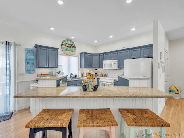 17 Spring Glen Road, Unit A East Lyme, CT 06357 - Photo 16 of 32 a kitchen with counter top space cabinets and appliances
