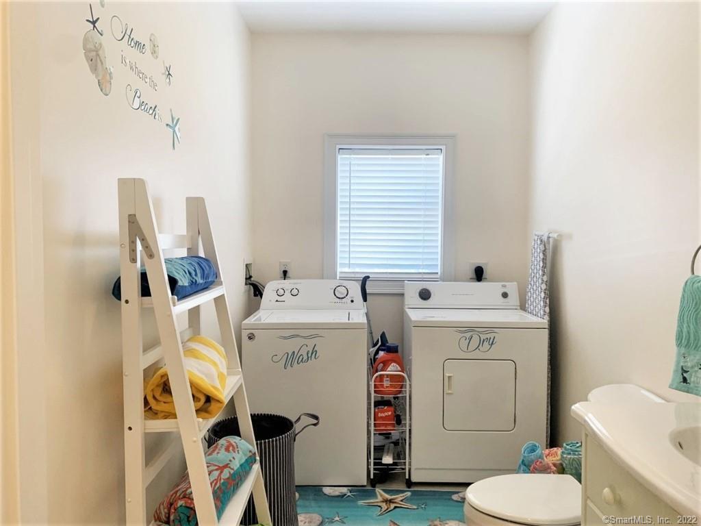 17 Spring Glen Road, Unit A East Lyme, CT 06357 - Photo 19 of 32 a utility room with dryer and washer