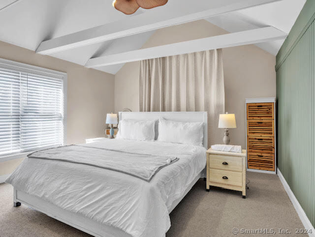 17 Spring Glen Road, Unit A East Lyme, CT 06357 - Photo 24 of 32 a bedroom with a bed and a cabinets