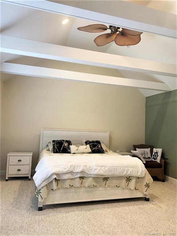 17 Spring Glen Road, Unit A East Lyme, CT 06357 - Photo 25 of 32 a bedroom with a bed and cabinets