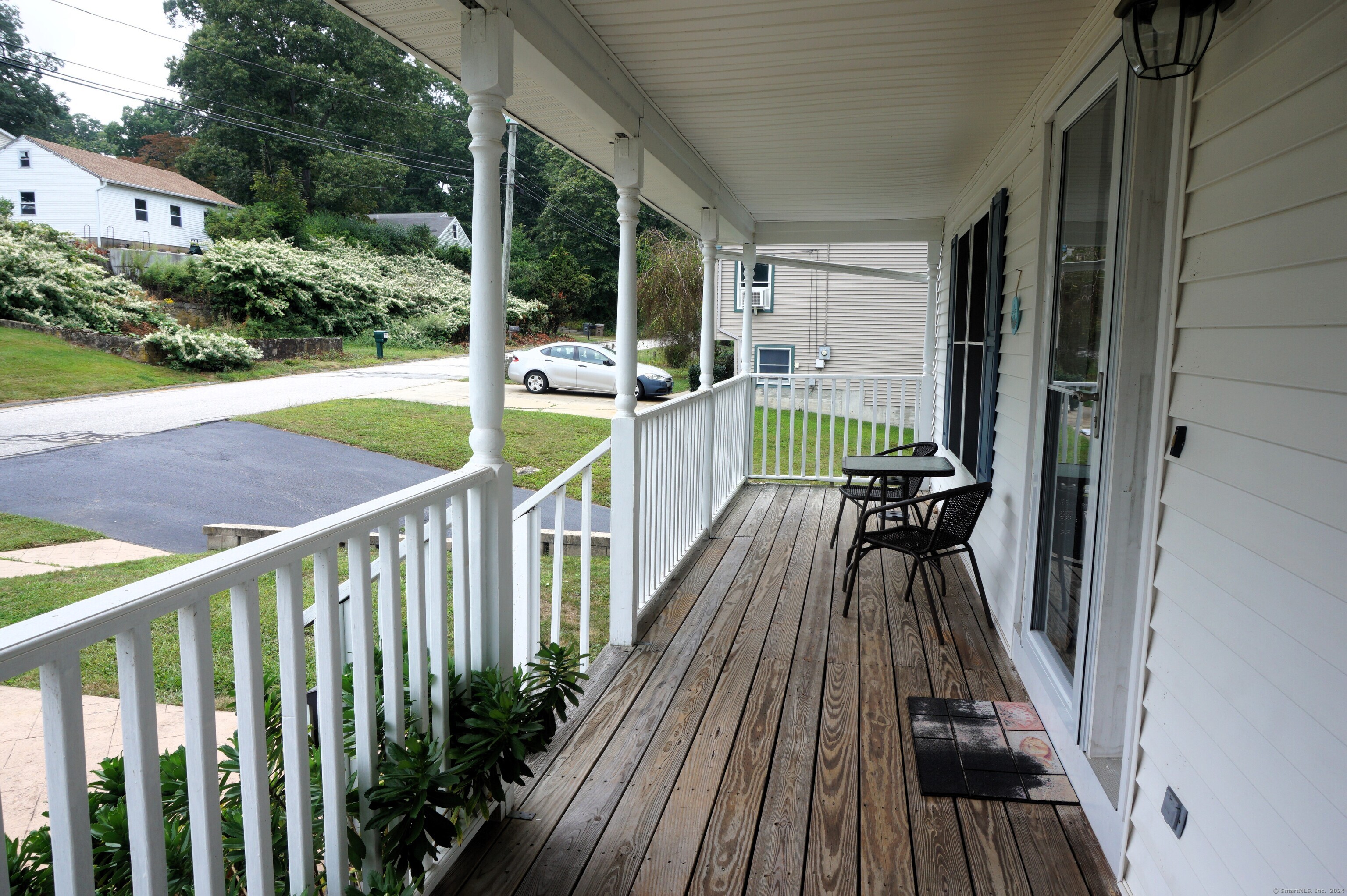 17 Spring Glen Road, Unit A East Lyme, CT 06357 - Photo 3 of 32 a view of balcony with couch