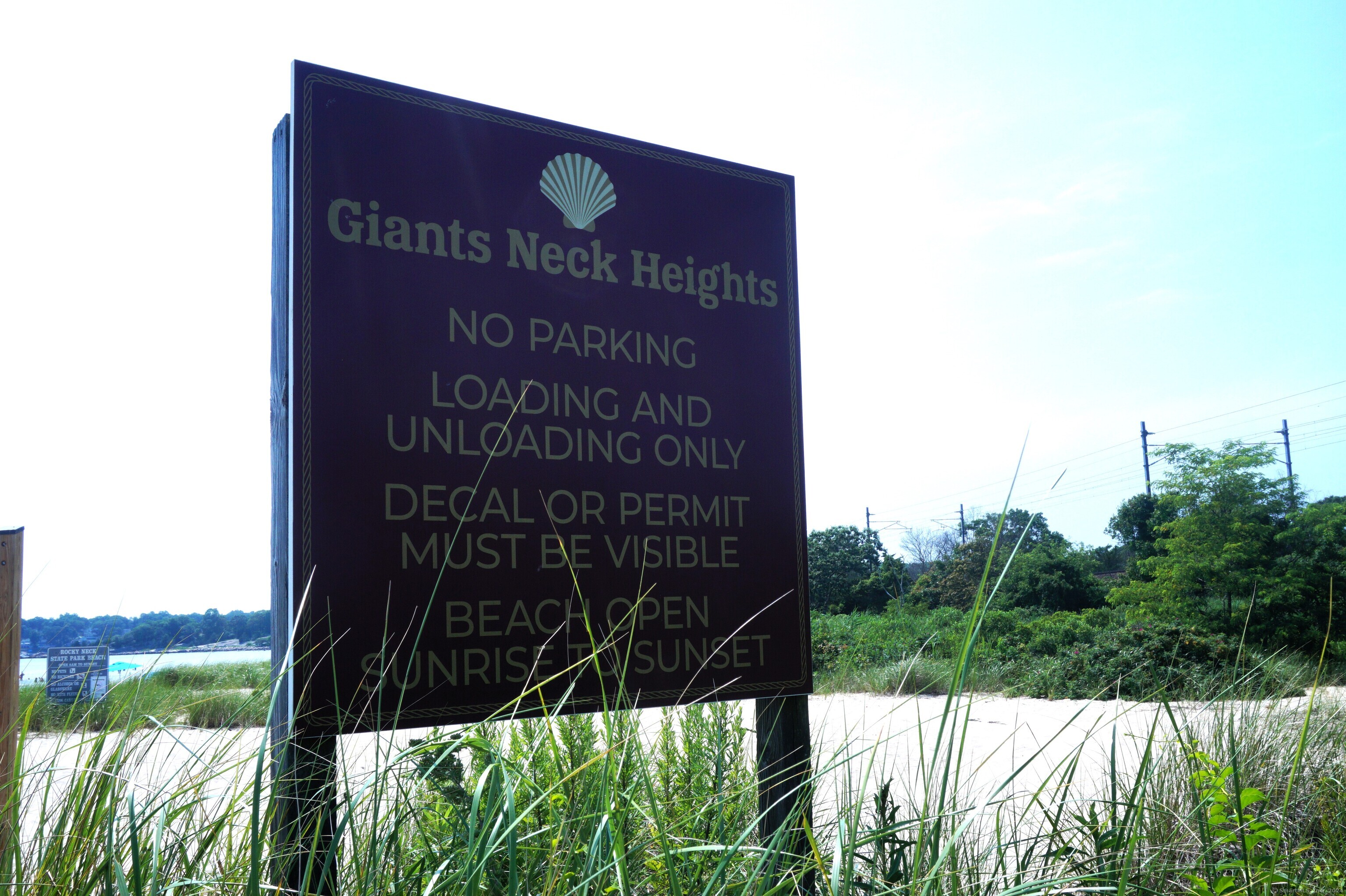 17 Spring Glen Road, Unit A East Lyme, CT 06357 - Photo 8 of 32 a view of a sign in a yard
