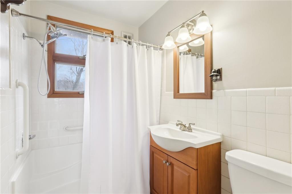 242 Mc Clelland Road Mercer, PA 16137 - Photo 12 of 26 a bathroom with a sink a toilet and shower
