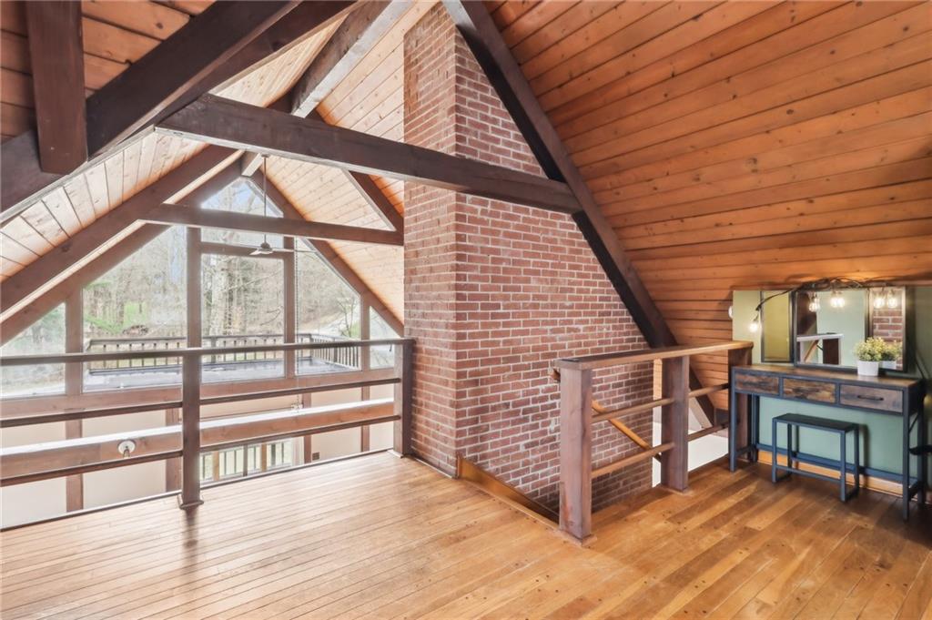 242 Mc Clelland Road Mercer, PA 16137 - Photo 13 of 26 a view of a porch with wooden floor and stairs