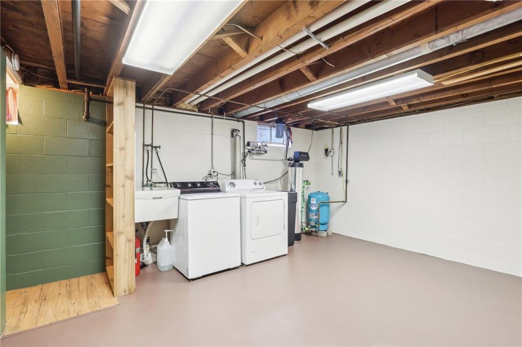 242 Mc Clelland Road Mercer, PA 16137 - Photo 18 of 26 a utility room with dryer and washer