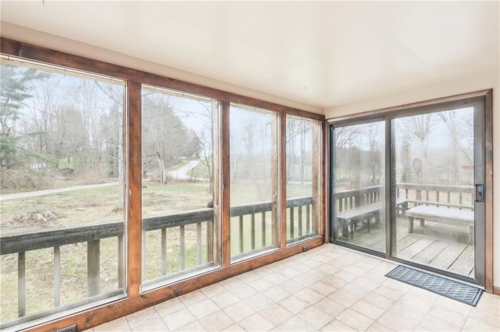 242 Mc Clelland Road Mercer, PA 16137 - Photo 19 of 26 a view of an empty room with a large window