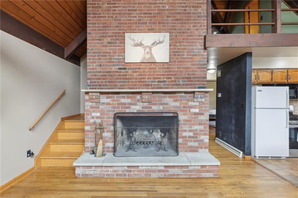 242 Mc Clelland Road Mercer, PA 16137 - Photo 3 of 26 a living room with a fireplace
