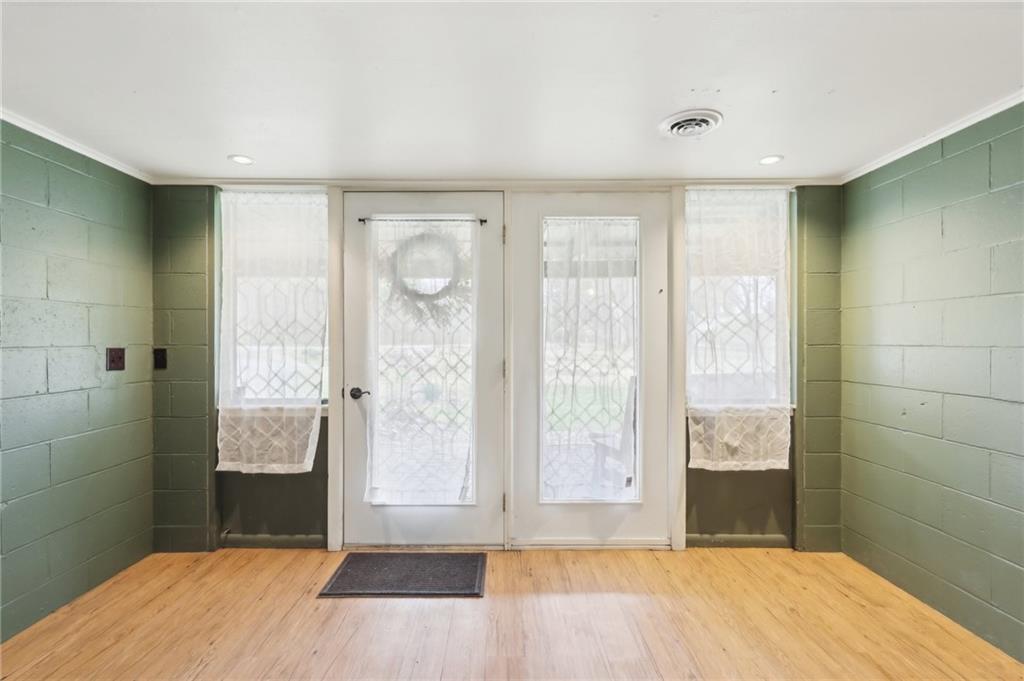 242 Mc Clelland Road Mercer, PA 16137 - Photo 8 of 26 a view of front door with wooden floor