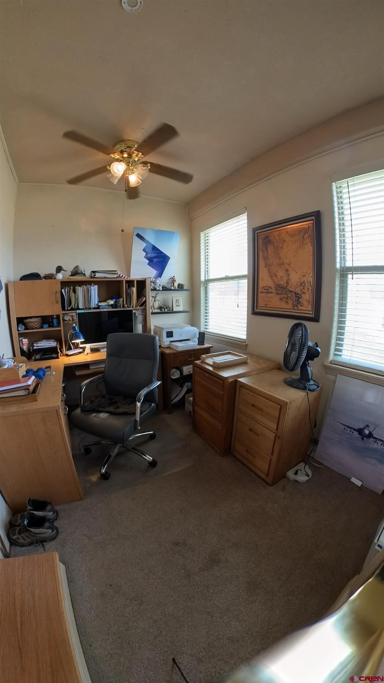 18200 Surface Creek Road Cedaredge, CO 81413 - Photo 31 of 39 a living room with furniture pool table and a window