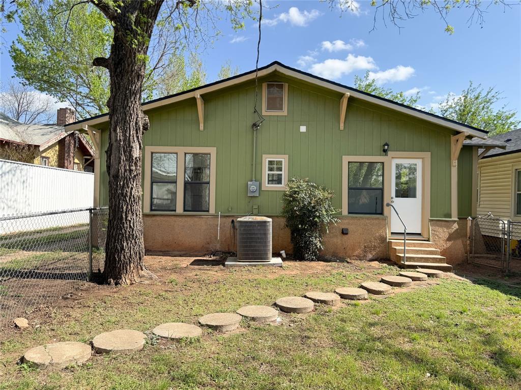 904 West 7th Street Cisco, TX 76437 - Photo 37 of 37 a front view of a house with a yard