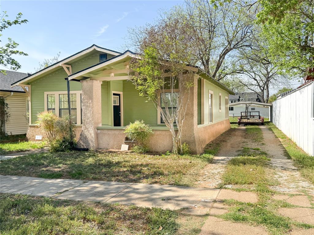 904 West 7th Street Cisco, TX 76437 - Photo 4 of 37 a view of a house with a yard