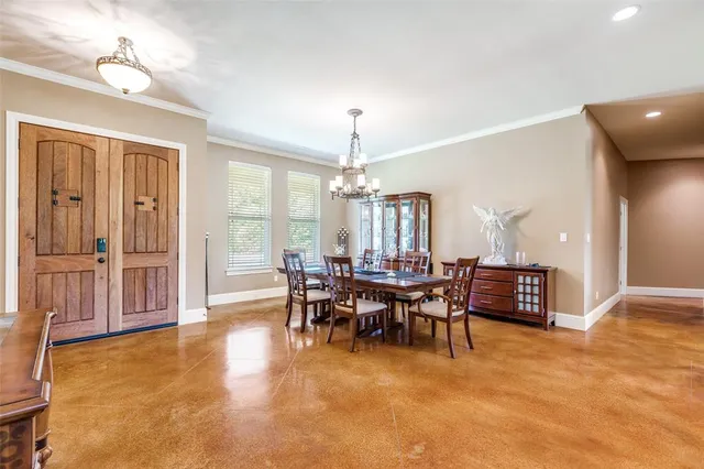 a view of a livingroom with furniture window and wooden floor