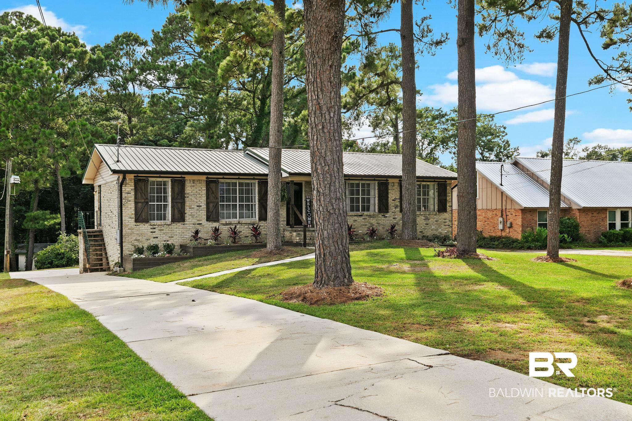 14 Lee Circle Daphne, AL 36527 - Photo 3 of 83 Ranch-style house with a front yard