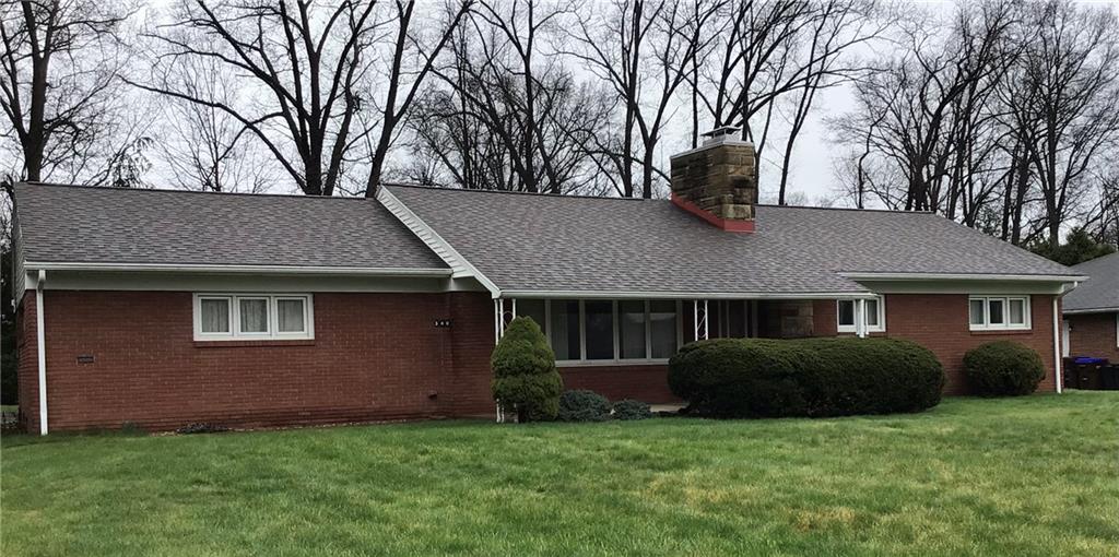 340 Carley Avenue Sharon, PA 16146 - Photo 3 of 28 a house that has a tree in front of a house