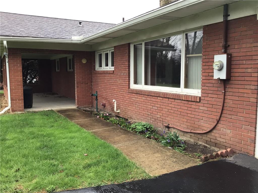 340 Carley Avenue Sharon, PA 16146 - Photo 7 of 28 a front view of a house with garden
