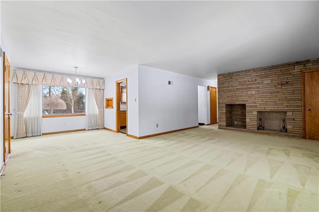 340 Carley Avenue Sharon, PA 16146 - Photo 8 of 28 an empty room with furniture and fireplace