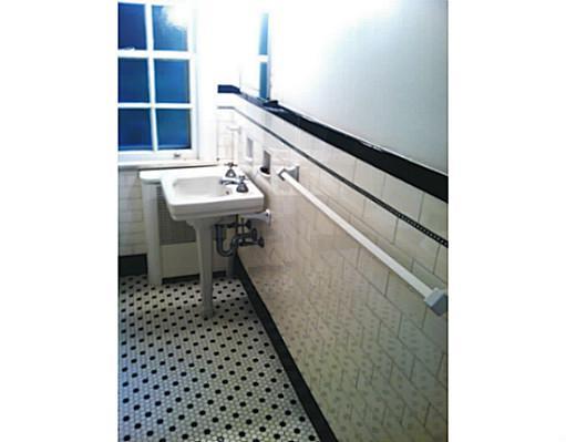 458 Sulgrave Road Pittsburgh, PA 15211 - Photo 13 of 14 Full Bath. Subway tile in bright, vintage bath