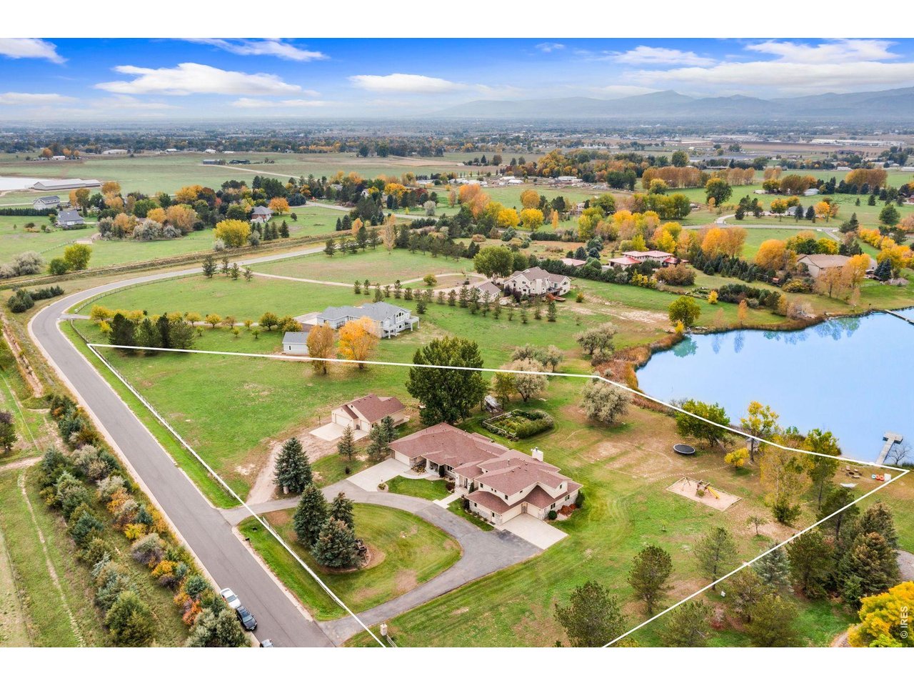 1055 Coho Run Fort Collins, CO 80524 - Photo 2 of 43 an aerial view of residential houses with outdoor space