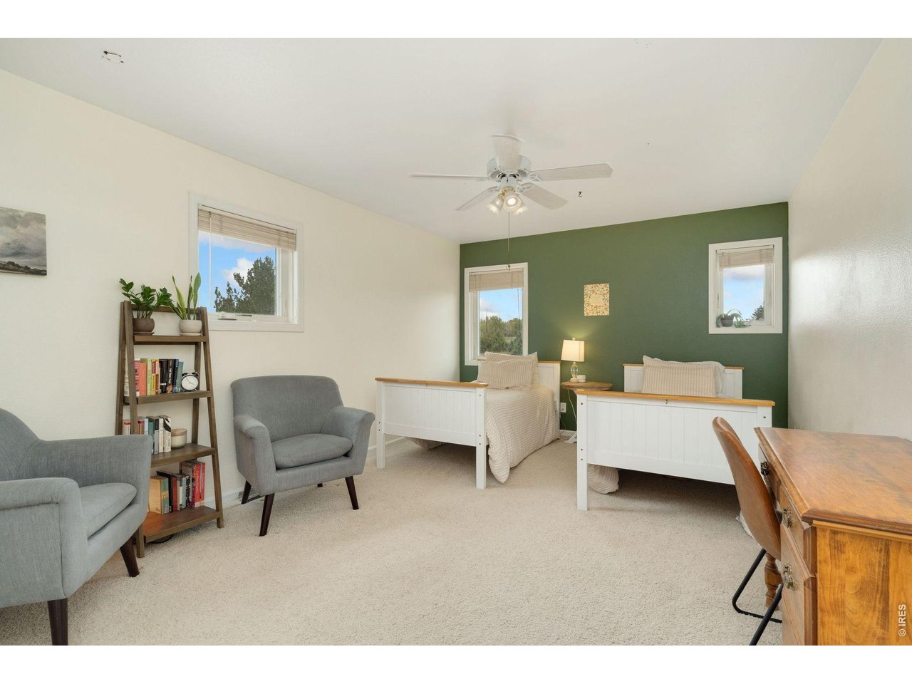 1055 Coho Run Fort Collins, CO 80524 - Photo 28 of 43 a living room with furniture and a wooden floor