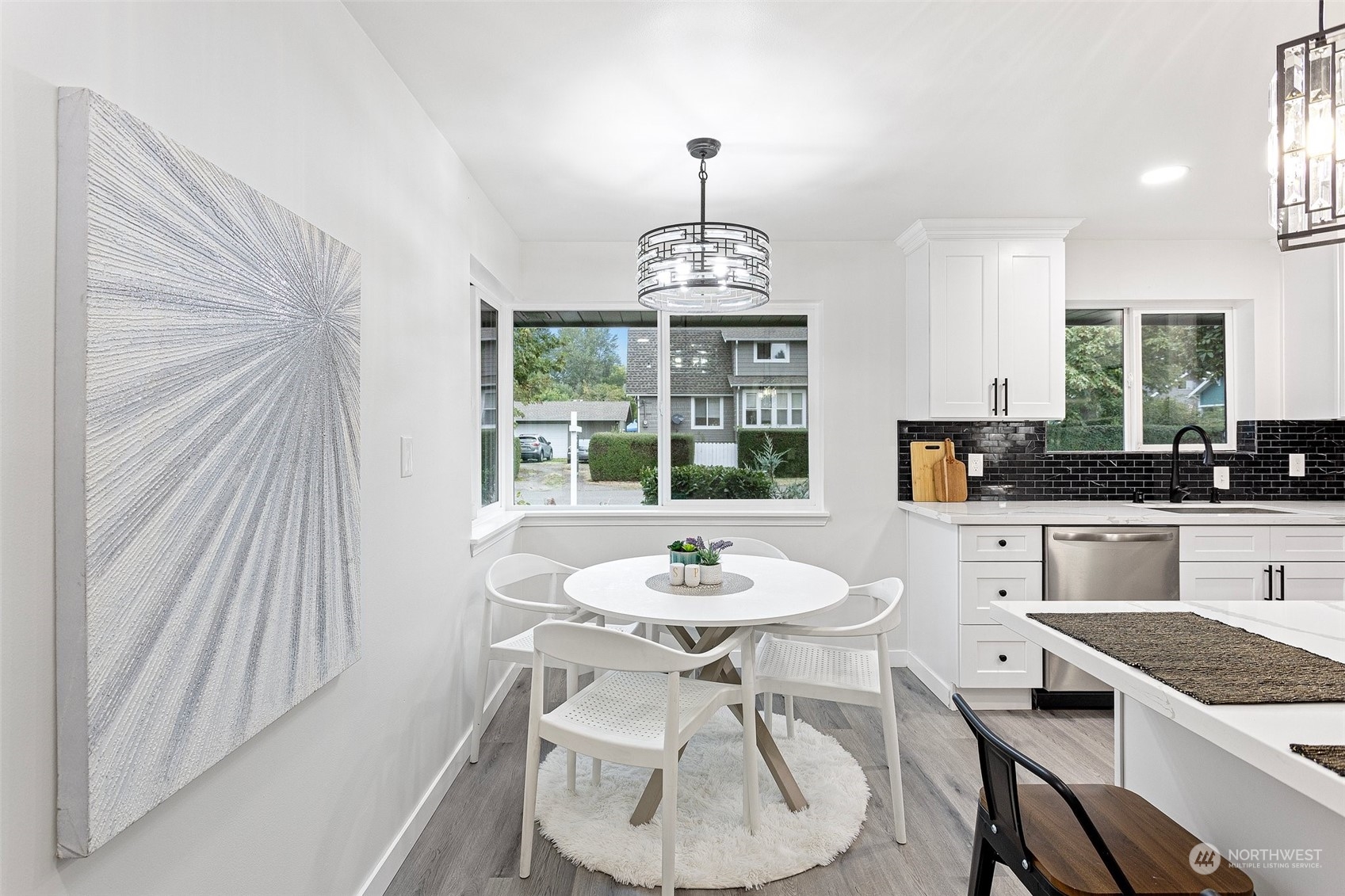 901 Southwest 3rd Place Renton, WA 98057 - Photo 20 of 24 a kitchen with a table and chairs in it