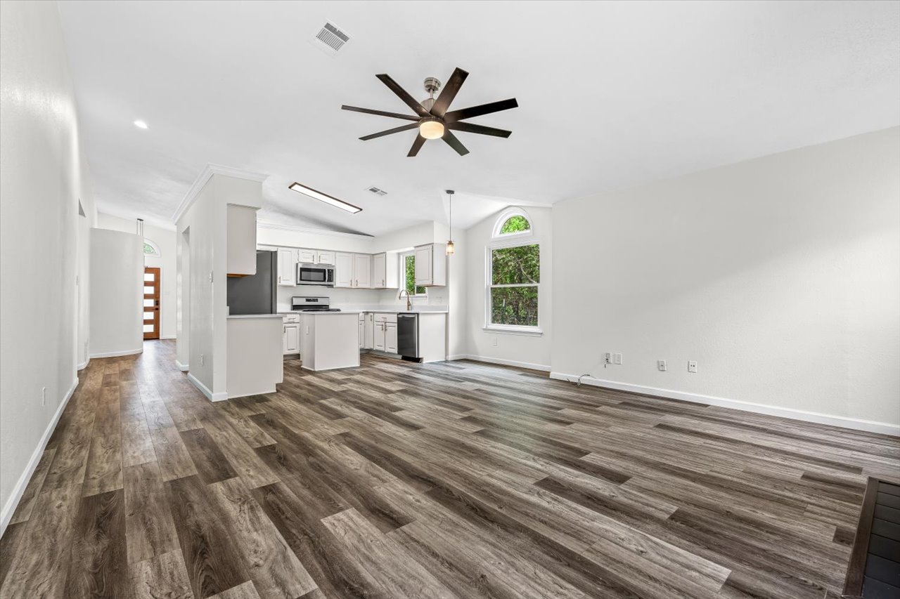 4004 Danli Lane Austin, TX 78749 - Photo 29 of 40 a view of a livingroom with kitchen appliances and furniture
