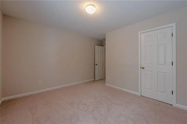 a view of a room with an empty space