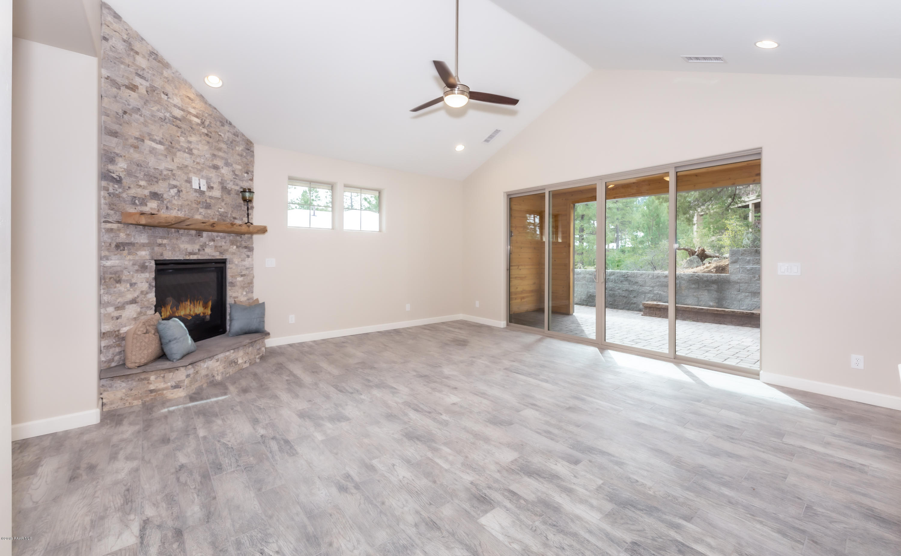 1183 West Timber Ridge Road Prescott, AZ 86303 - Photo 4 of 23 Floor to ceiling fireplace