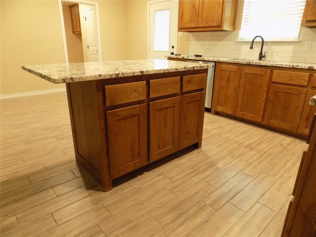 2007 Brown Loop Poolville, TX 76487 - Photo 13 of 32 a bathroom with a sink and a mirror