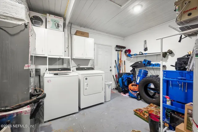 a utility room with dryer and washer