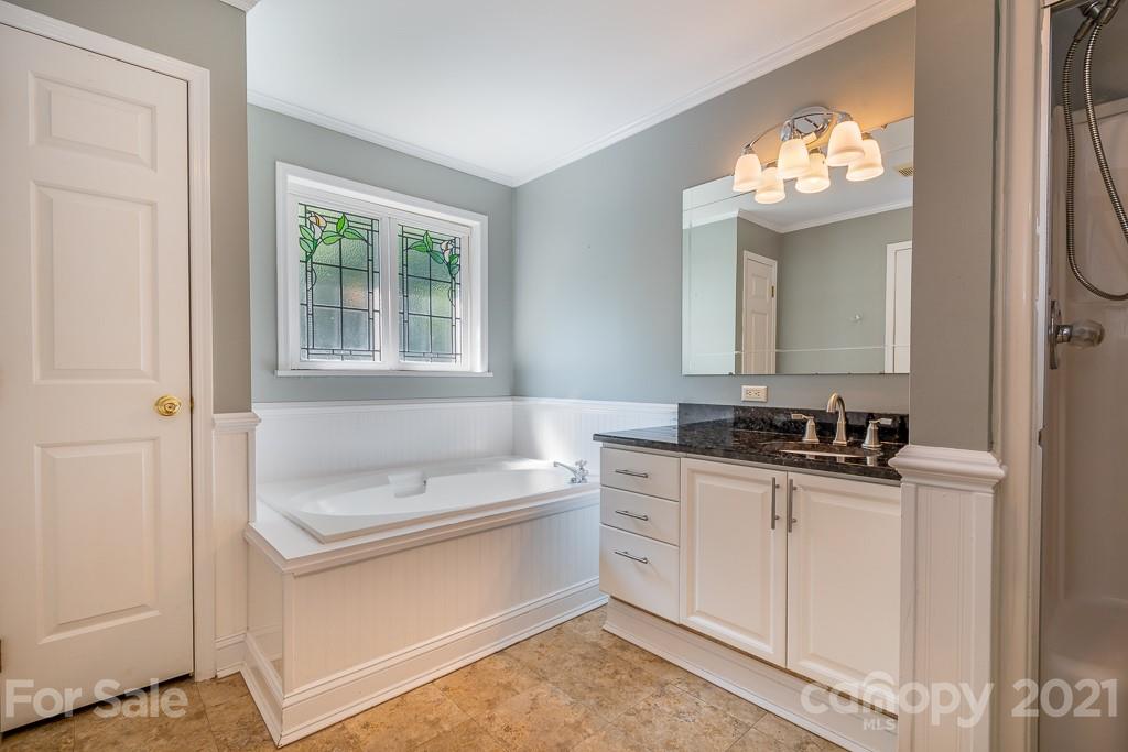 7230 Denmark Drive Denver, NC 28037 - Photo 20 of 41 a bathroom with a sink a vanity and a mirror