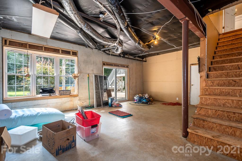 7230 Denmark Drive Denver, NC 28037 - Photo 26 of 41 a indoor patio with swimming pool and glass windows