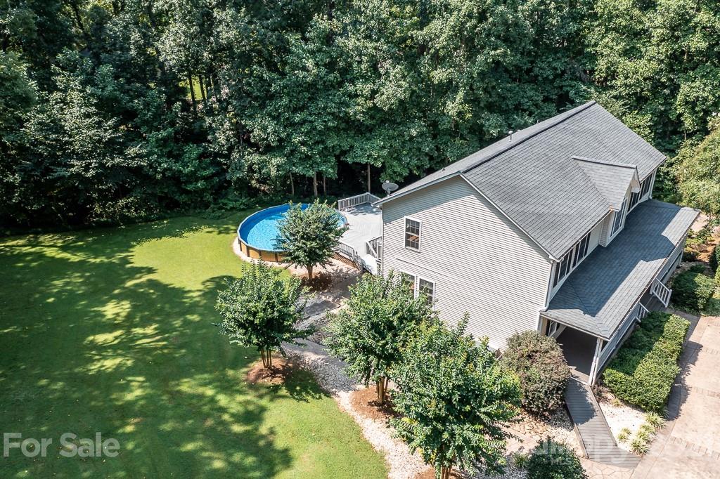 7230 Denmark Drive Denver, NC 28037 - Photo 38 of 41 a backyard of a house with lots of green space
