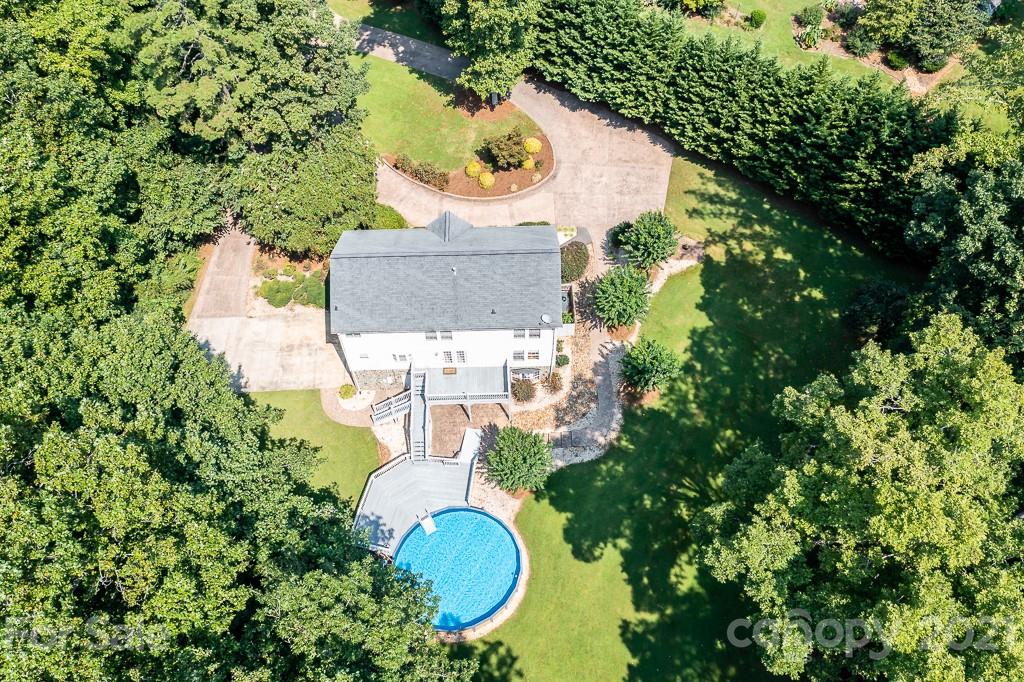 7230 Denmark Drive Denver, NC 28037 - Photo 40 of 41 an aerial view of a house with outdoor space and trees all around
