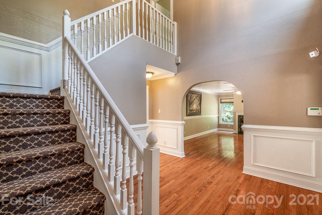 7230 Denmark Drive Denver, NC 28037 - Photo 8 of 41 a view of entryway and hall with wooden floor