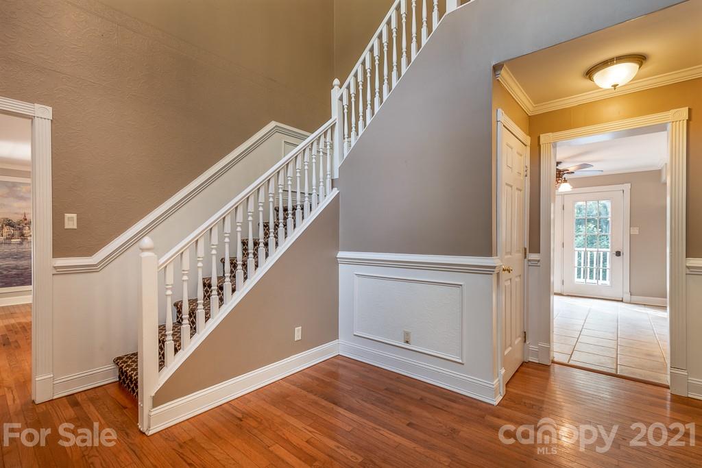7230 Denmark Drive Denver, NC 28037 - Photo 9 of 41 a view of entryway and hall with wooden floor