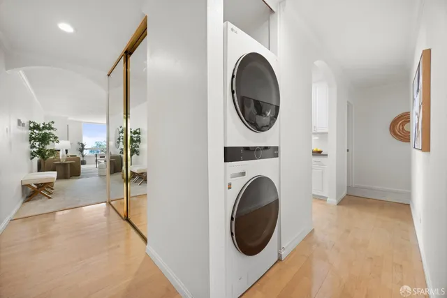 a view of a livingroom with furniture and a potted plant