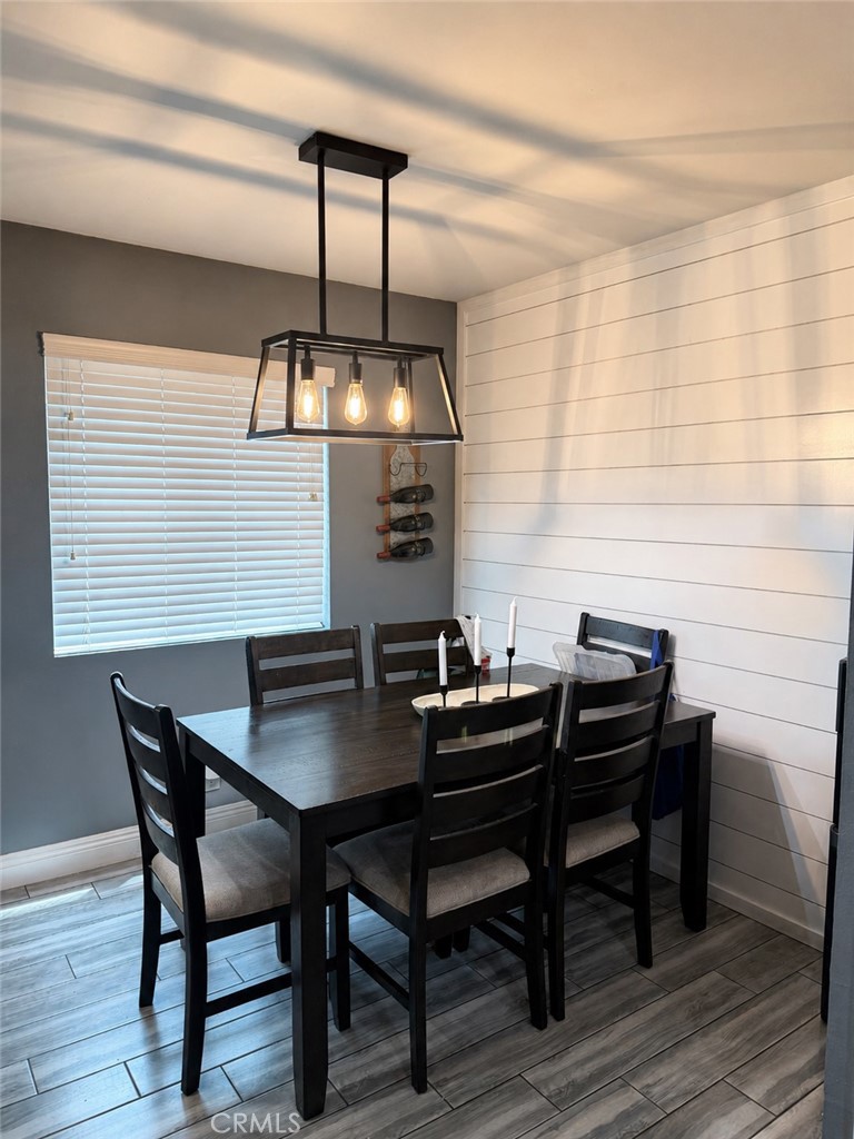 7258 Exeter Street, Unit 6 Paramount, CA 90723 - Photo 3 of 16 a view of a dining room with furniture